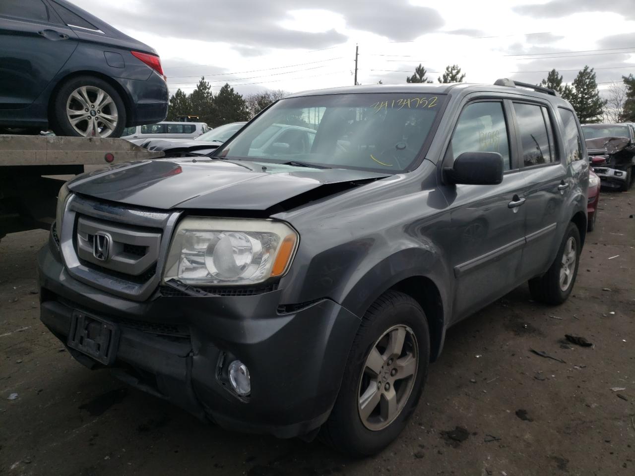 Photo 2 from auction – 2009 HONDA PILOT EX with VIN 5FNYF484X9B001669