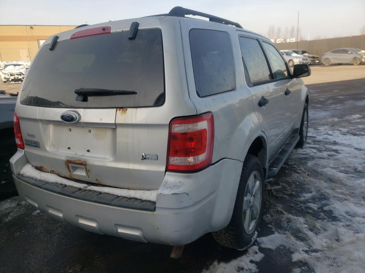 Photo 4 from auction – 2010 FORD ESCAPE XLT with VIN 1FMCU9DG8AKC97615