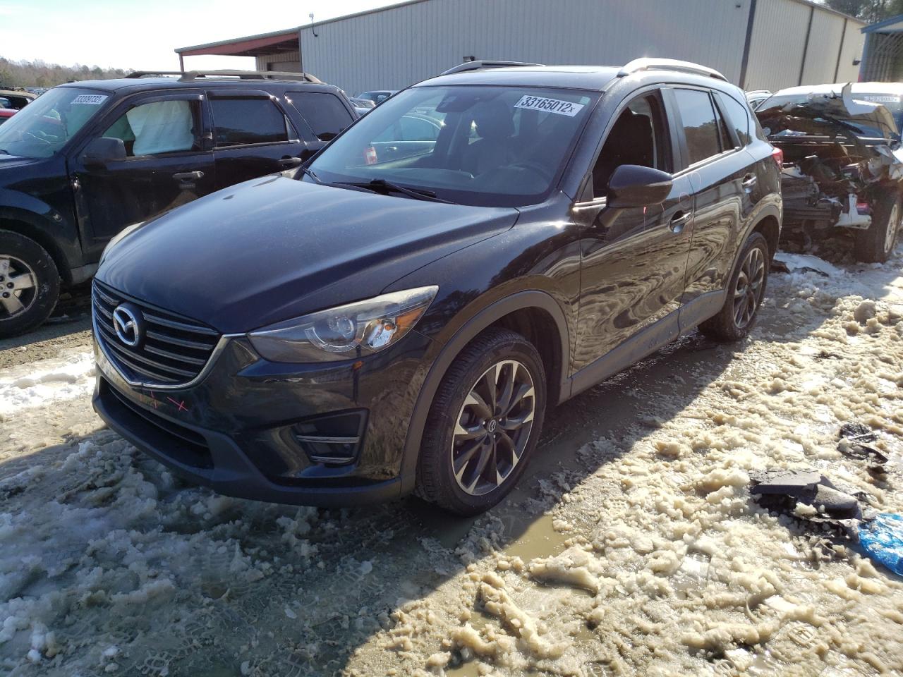 Photo 2 from auction – 2016 MAZDA CX-5 GT with VIN JM3KE4DY4G0814915
