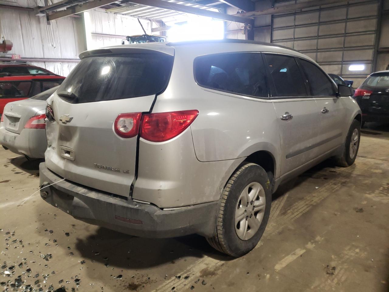 Photo 4 from auction – 2010 CHEVROLET TRAVERSE L with VIN 1GNLREED6AS101973