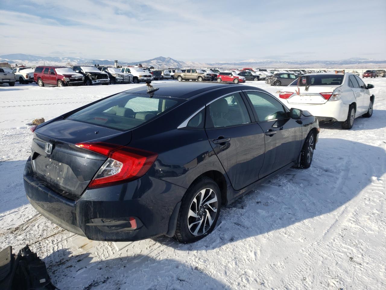 Photo 4 from auction – 2017 HONDA CIVIC EX with VIN 2HGFC2F7XHH567794