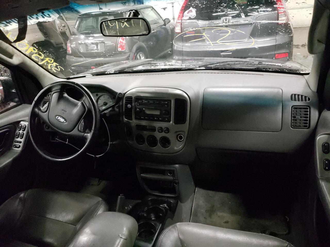 Photo 9 from auction – 2003 FORD ESCAPE XLT with VIN 1FMYU93173KA08326