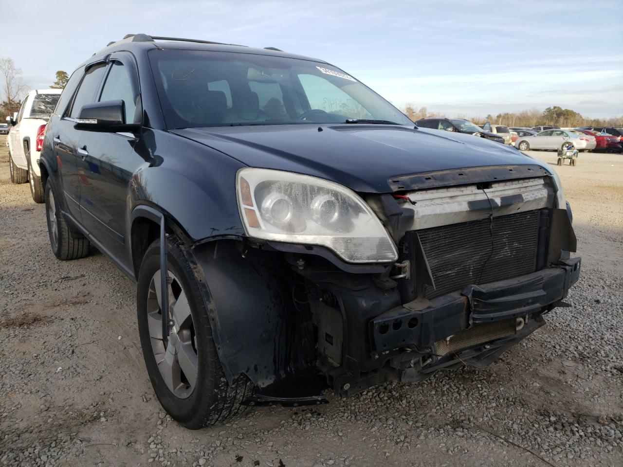 GMC ACADIA SLT 2011 with VIN 1GKKRRED4BJ143369 - Photo from auction