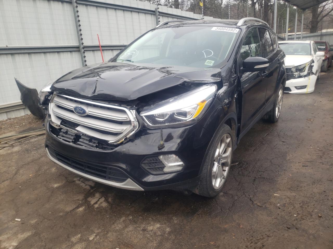 Photo 2 from auction – 2019 FORD ESCAPE TIT with VIN 1FMCU9J90KUA87571