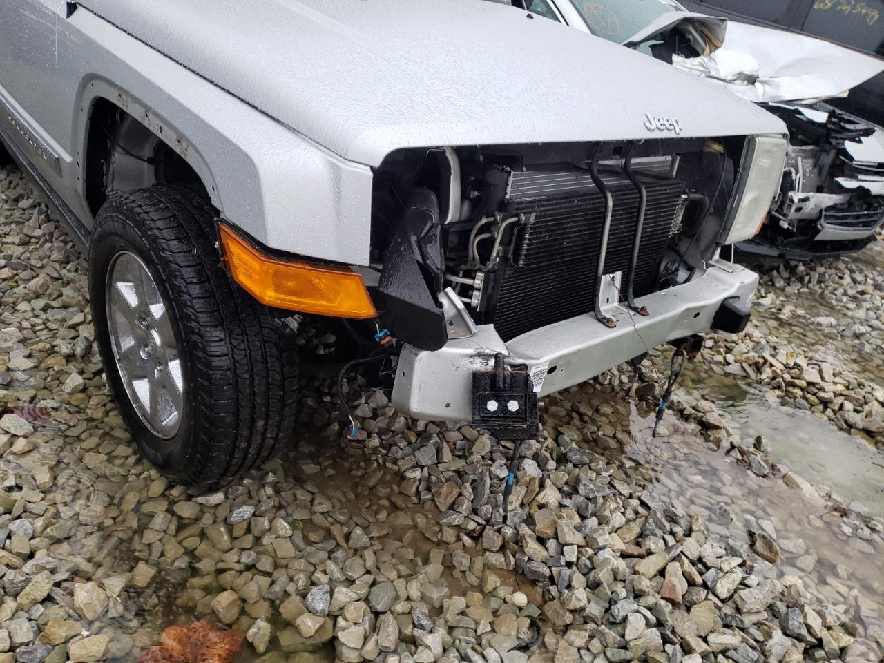 Photo 10 from auction – 2006 JEEP COMMANDER with VIN 1J8HG582X6C214821