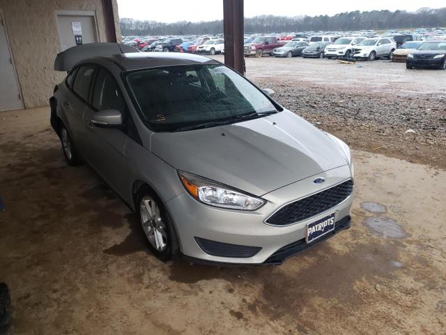 FORD FOCUS SE 2016 with VIN 1FADP3F27GL219463 - Photo from auction