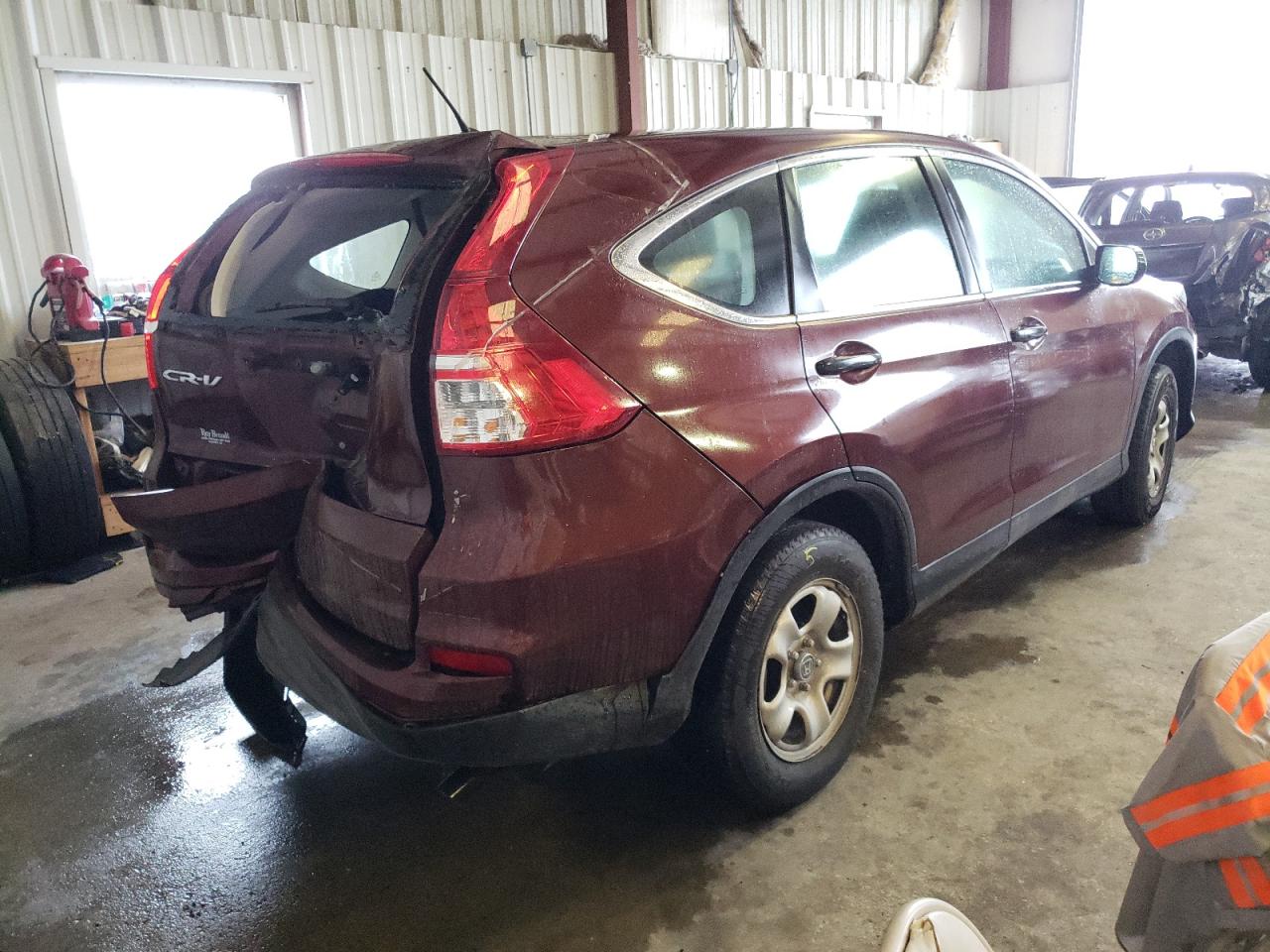 Photo 4 from auction – 2015 HONDA CR-V LX with VIN 3CZRM3H30FG709540