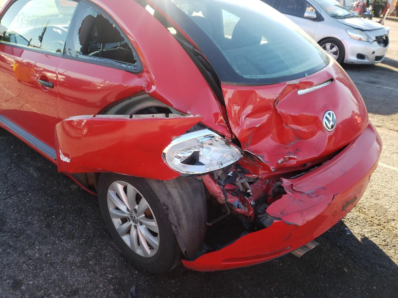 Photo 9 from auction – 2013 VOLKSWAGEN BEETLE with VIN 3VWFP7AT1DM663195