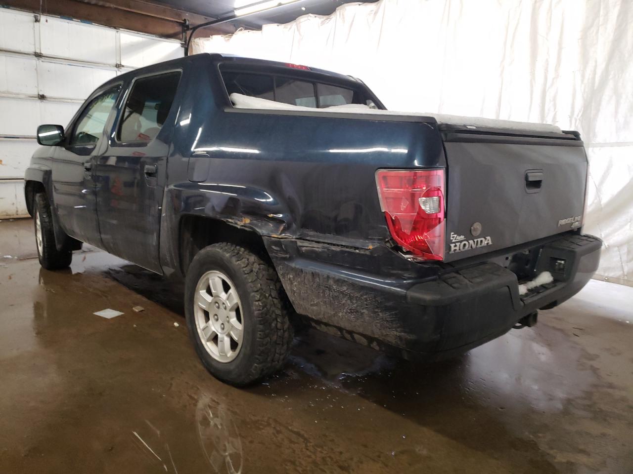 Photo 3 from auction – 2011 HONDA RIDGELINE with VIN 5FPYK1F40BB451230