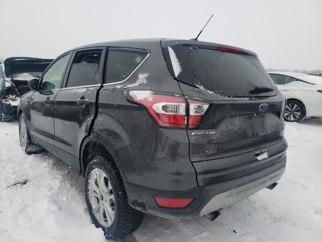 Photo 3 from auction – 2017 FORD ESCAPE SE with VIN 1FMCU9GD8HUA53611