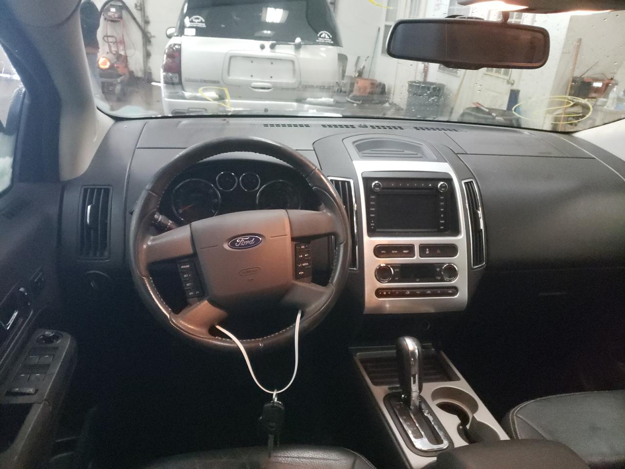 Photo 9 from auction – 2009 FORD EDGE LIMIT with VIN 2FMDK49C49BA78417