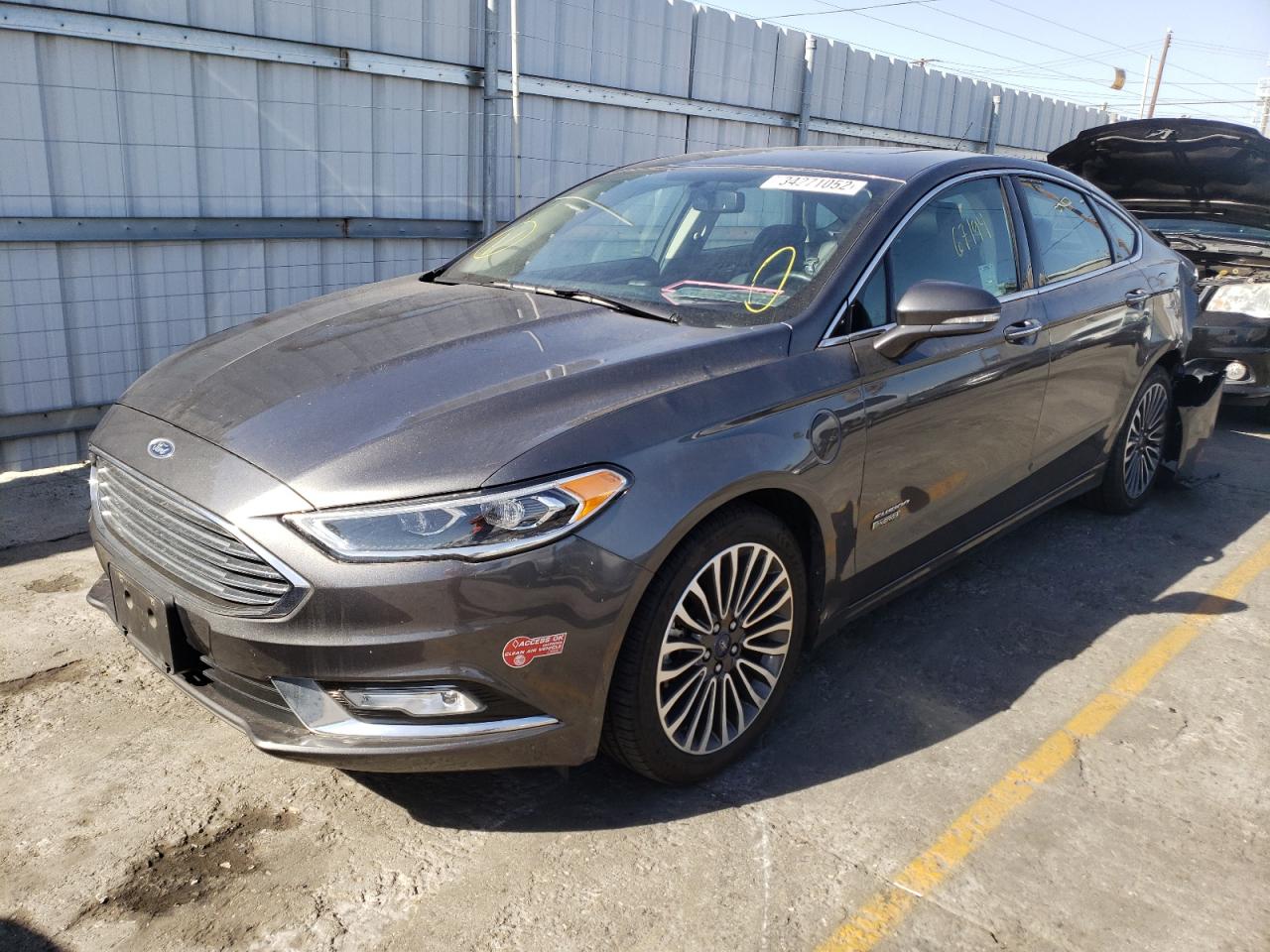 Photo 2 from auction – 2018 FORD FUSION TIT with VIN 3FA6P0SU8JR211606