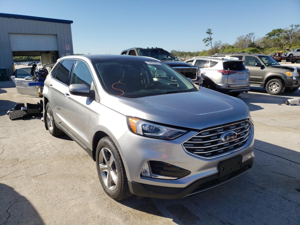 FORD EDGE SEL 2022 with VIN 2FMPK4J98NBA09916 - Photo from auction