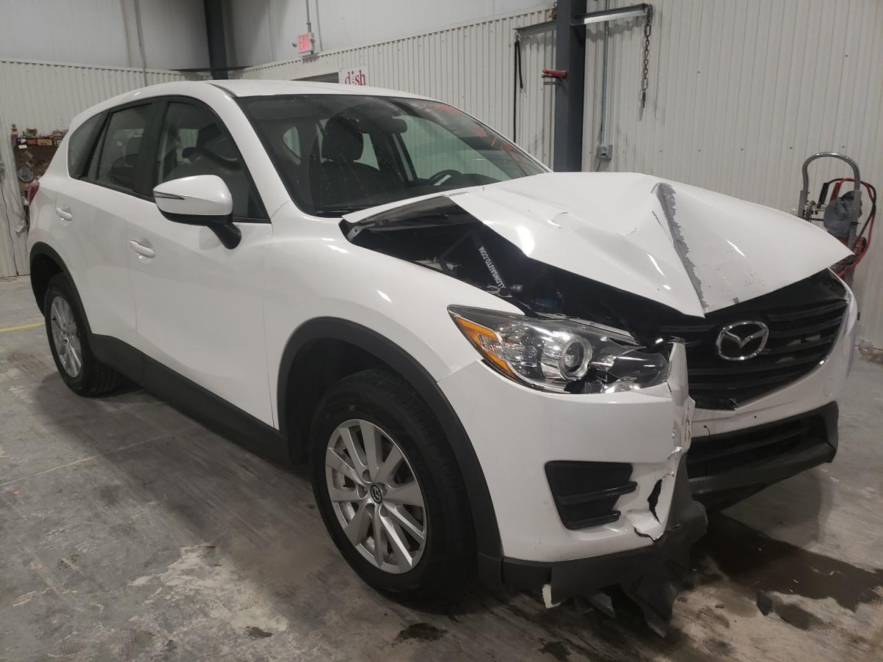 MAZDA CX-5 SPORT 2016 with VIN JM3KE4BY4G0628293 - Photo from auction