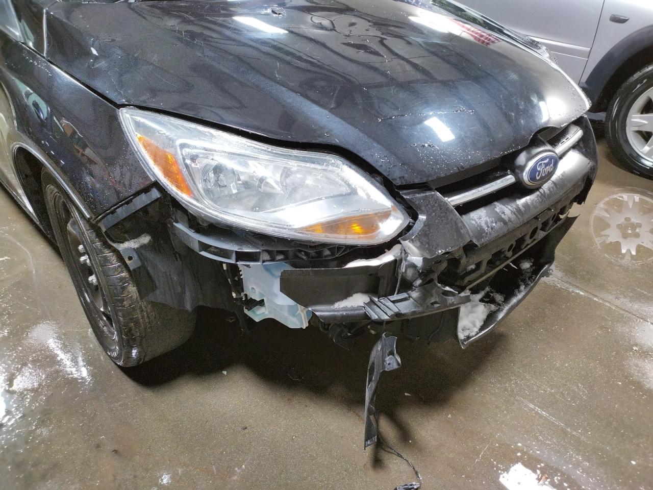 Photo 9 from auction – 2012 FORD FOCUS SE with VIN 1FAHP3K22CL346574