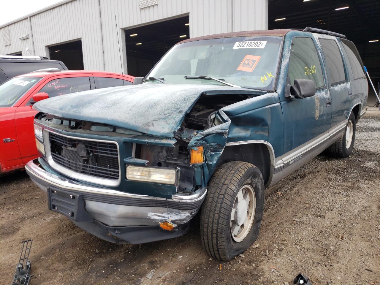 Photo 2 from auction – 1998 GMC YUKON with VIN 1GKEC13R3WJ723068