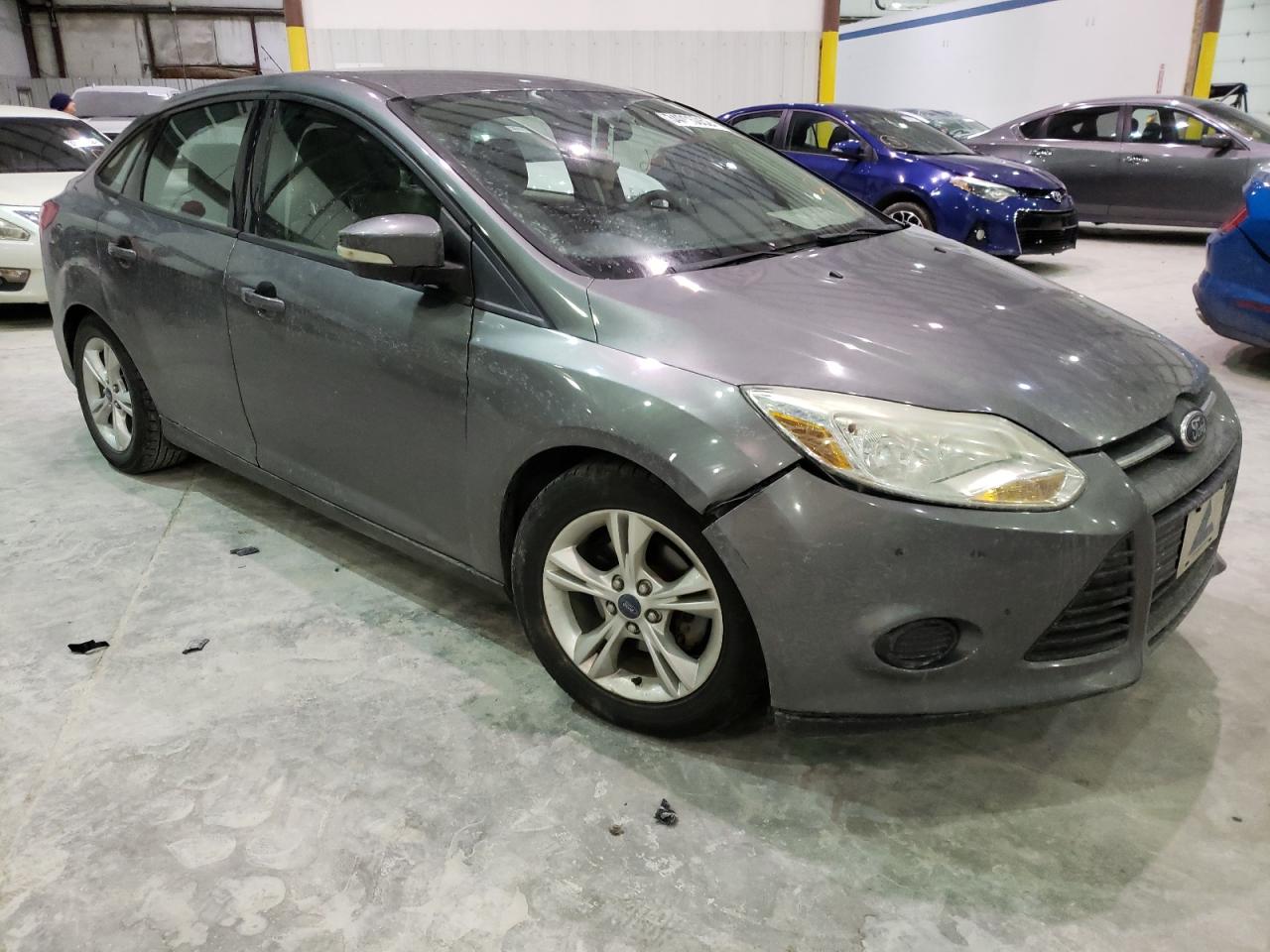 FORD FOCUS SE 2014 with VIN 1FADP3F21EL193536 - Photo from auction