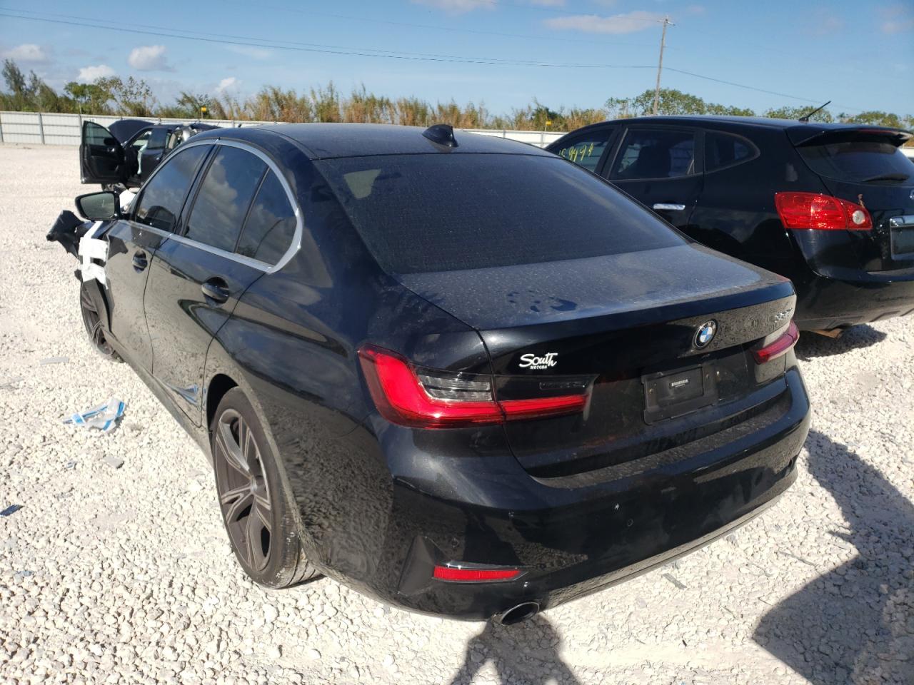 Photo 3 from auction – 2021 BMW 330I with VIN 3MW5R1J00M8B95770