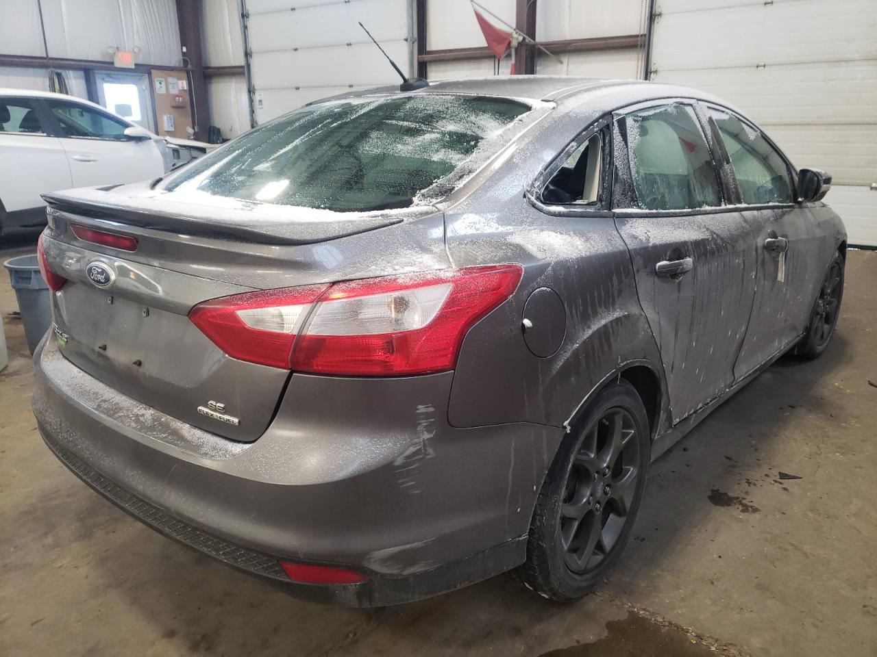 Photo 4 from auction – 2013 FORD FOCUS SE with VIN 1FADP3F24DL377433