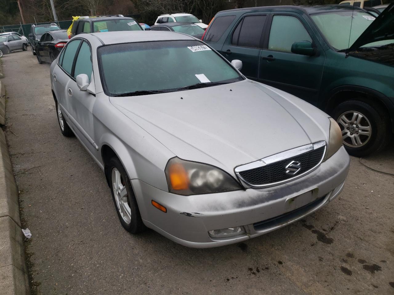 SUZUKI VERONA S 2004 with VIN KL5VJ52L24B104982 - Photo from auction