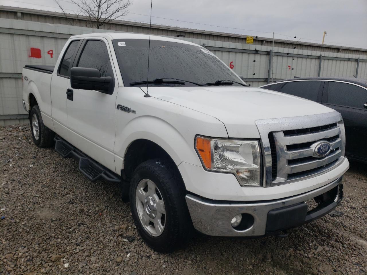 FORD F150 SUPER 2011 with VIN 1FTFX1EF0BFA10553 - Photo from auction