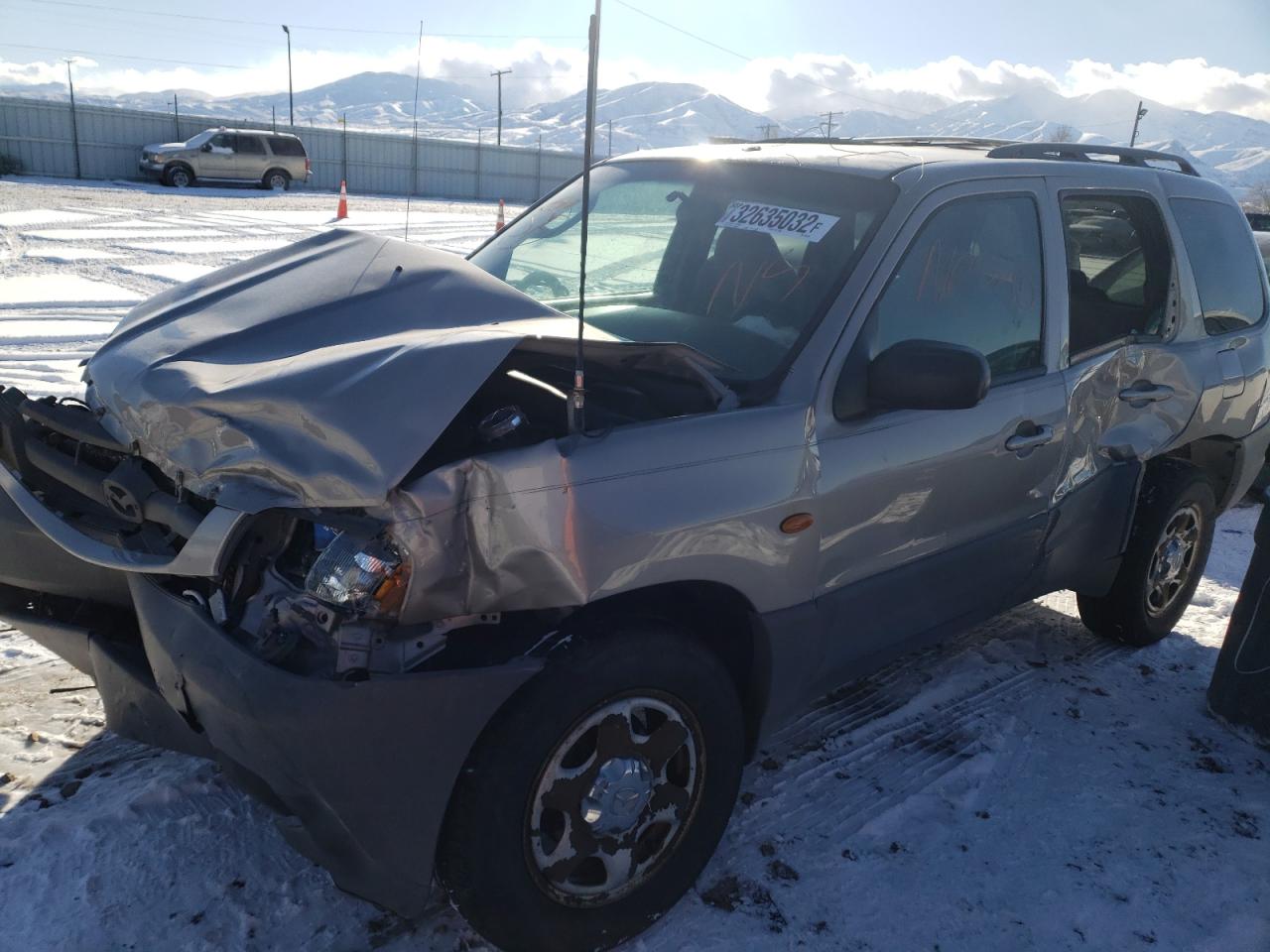 Photo 10 from auction – 2001 MAZDA TRIBUTE with VIN 4F2YU06B81KM53935