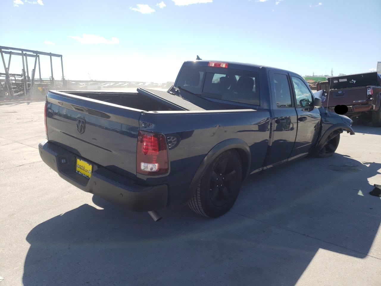 Photo 4 from auction – 2021 RAM 1500 CLASS with VIN 1C6RR6GG0MS520459