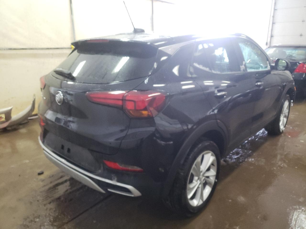 Photo 4 from auction – 2021 BUICK ENCORE GX with VIN KL4MMCSL2MB075673