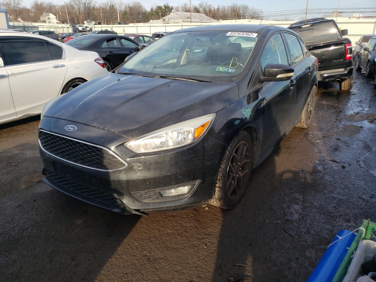 Photo 2 from auction – 2015 FORD FOCUS SE with VIN 1FADP3F25FL252136