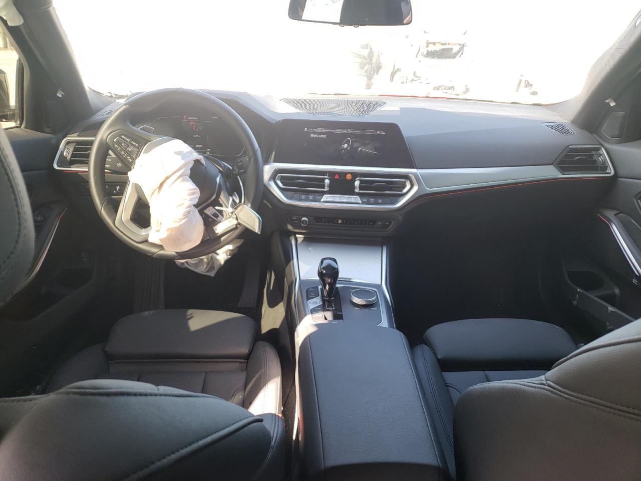 Photo 9 from auction – 2021 BMW 330I with VIN 3MW5R1J00M8B95770
