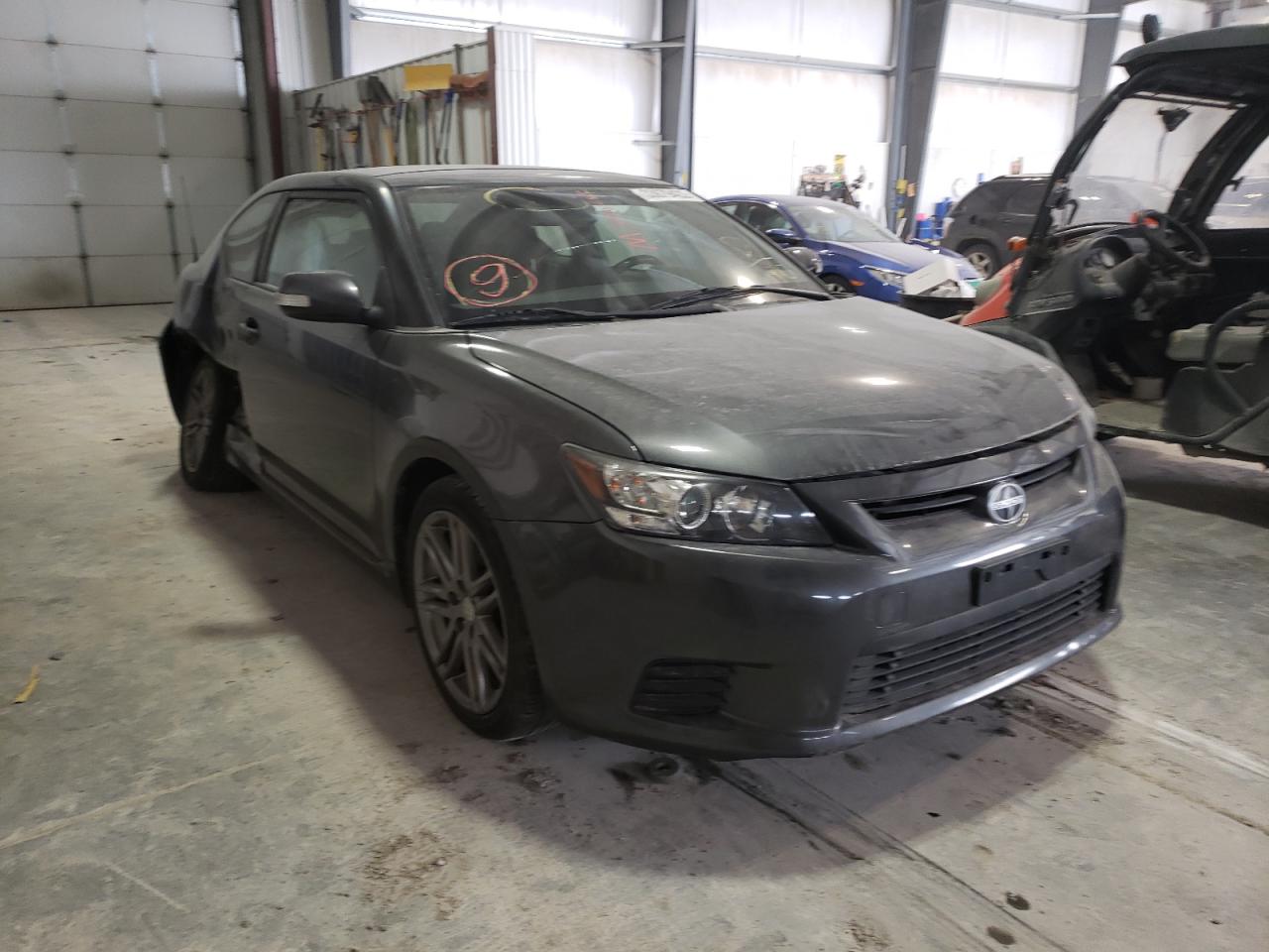 TOYOTA SCION TC 2011 with VIN JTKJF5C70B3011910 - Photo from auction