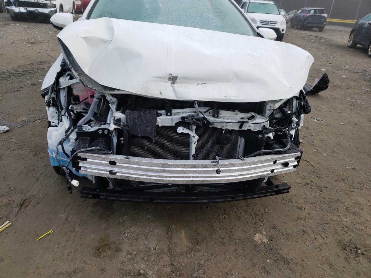 Photo 9 from auction – 2021 TOYOTA COROLLA LE with VIN JTDEPMAE4MJ142919