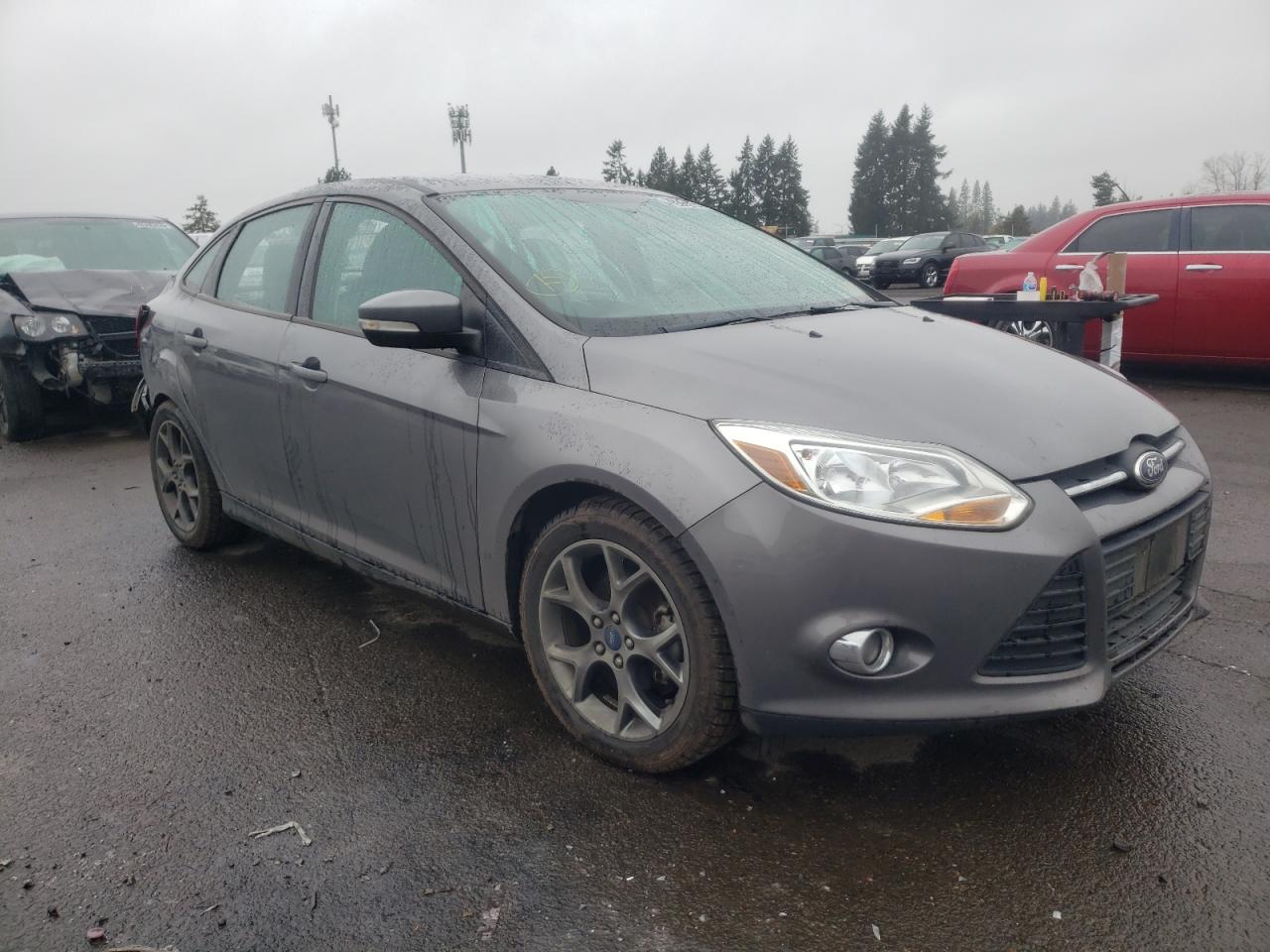 FORD FOCUS SE 2014 with VIN 1FADP3F27EL119053 - Photo from auction