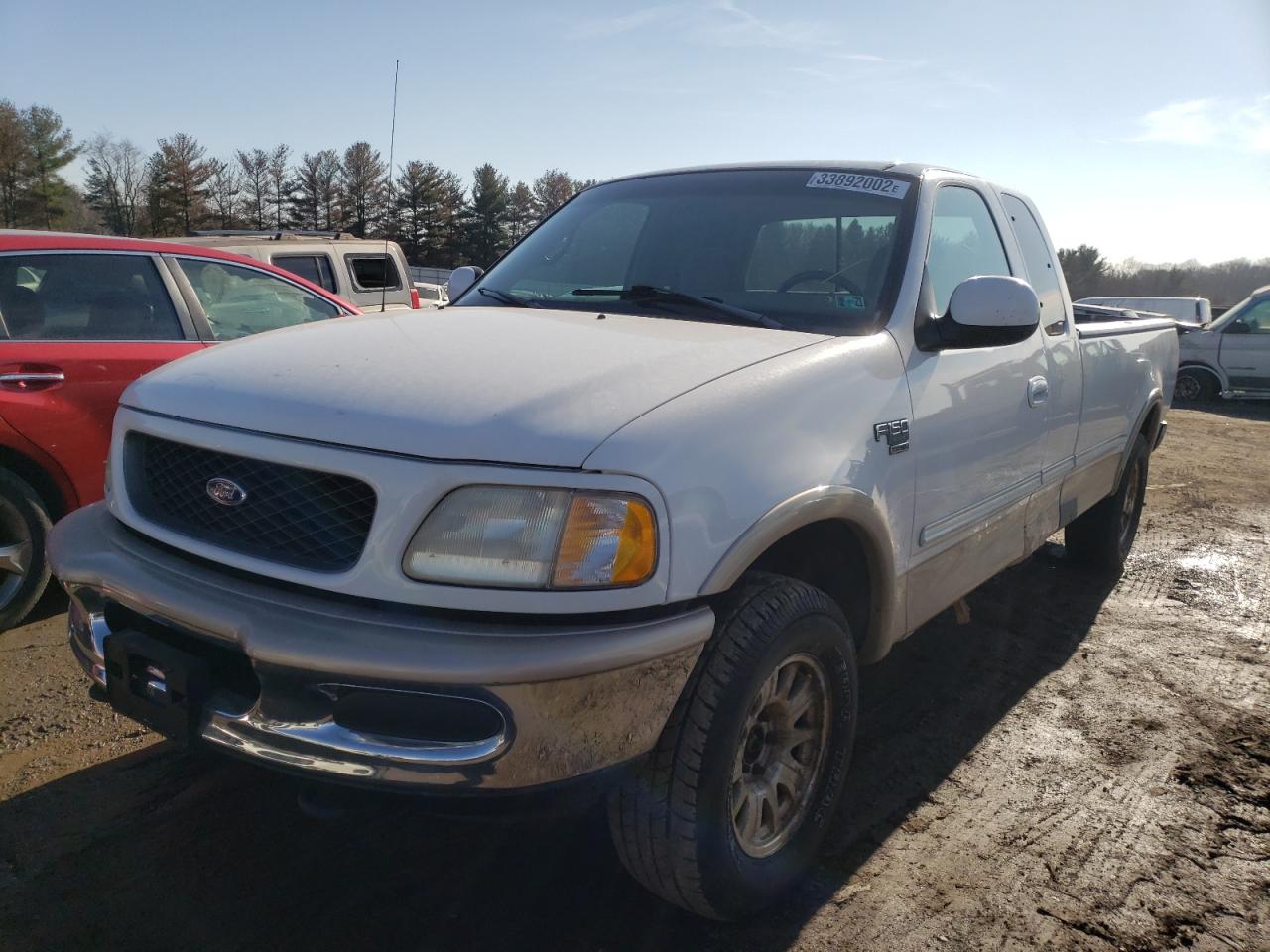 Photo 2 from auction – 1998 FORD F150 with VIN 1FTRX18L7WKC45219