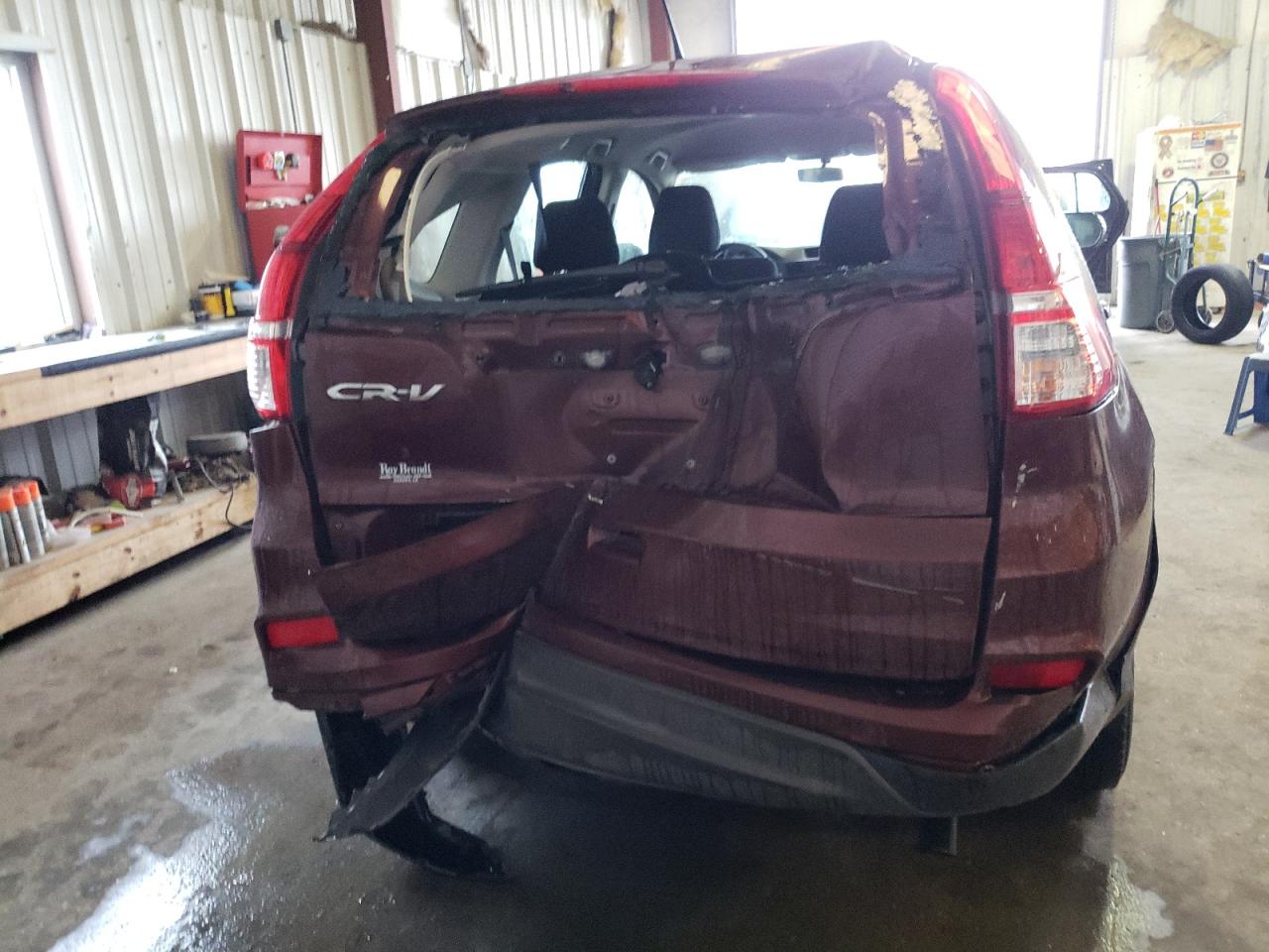 Photo 9 from auction – 2015 HONDA CR-V LX with VIN 3CZRM3H30FG709540