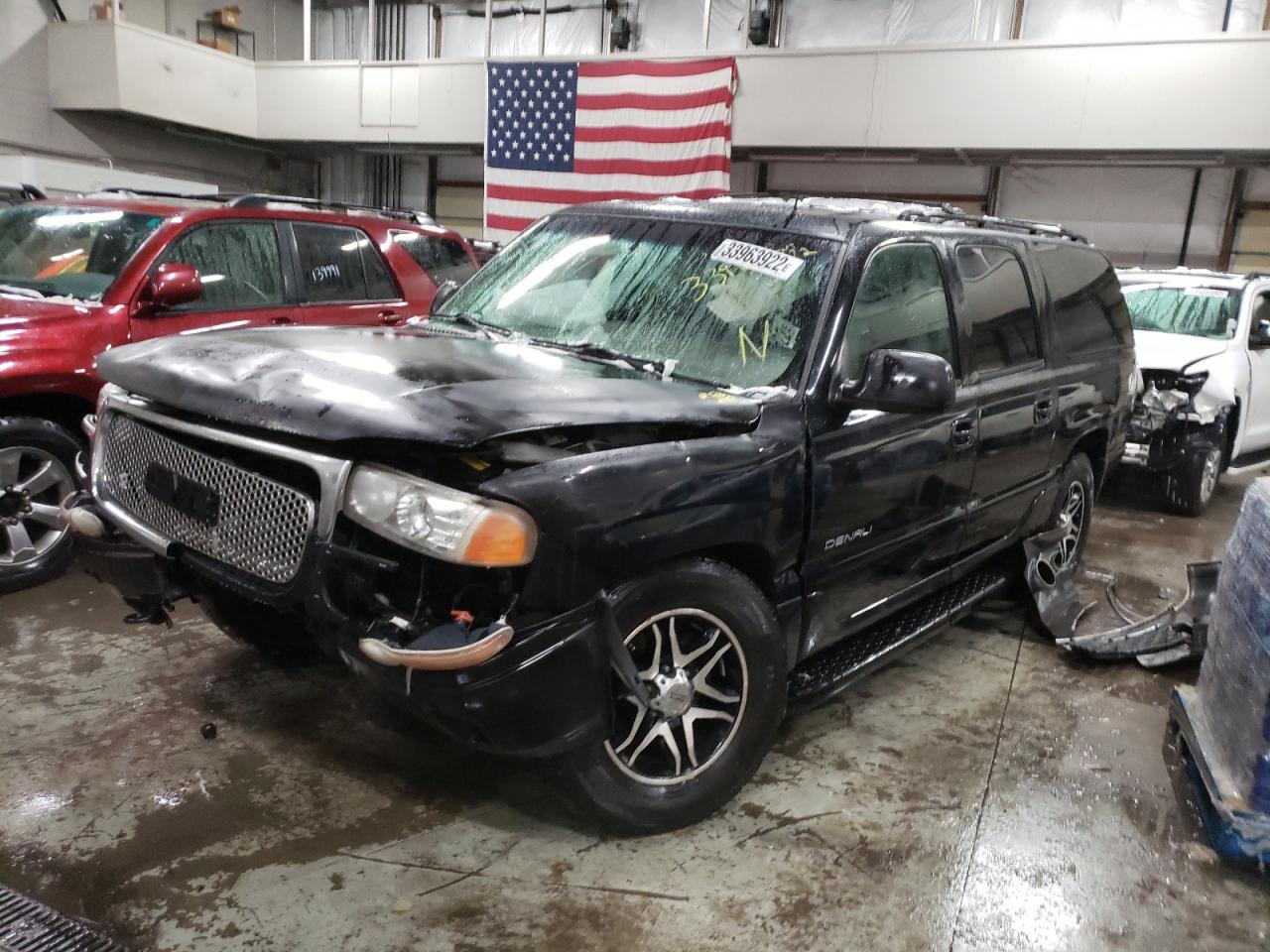 Photo 2 from auction – 2002 GMC DENALI XL with VIN 1GKFK66U82J144446