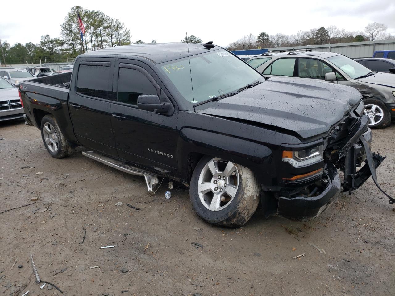 CHEVROLET SILVERADO 2018 with VIN 3GCUKREC9JG582101 - Photo from auction