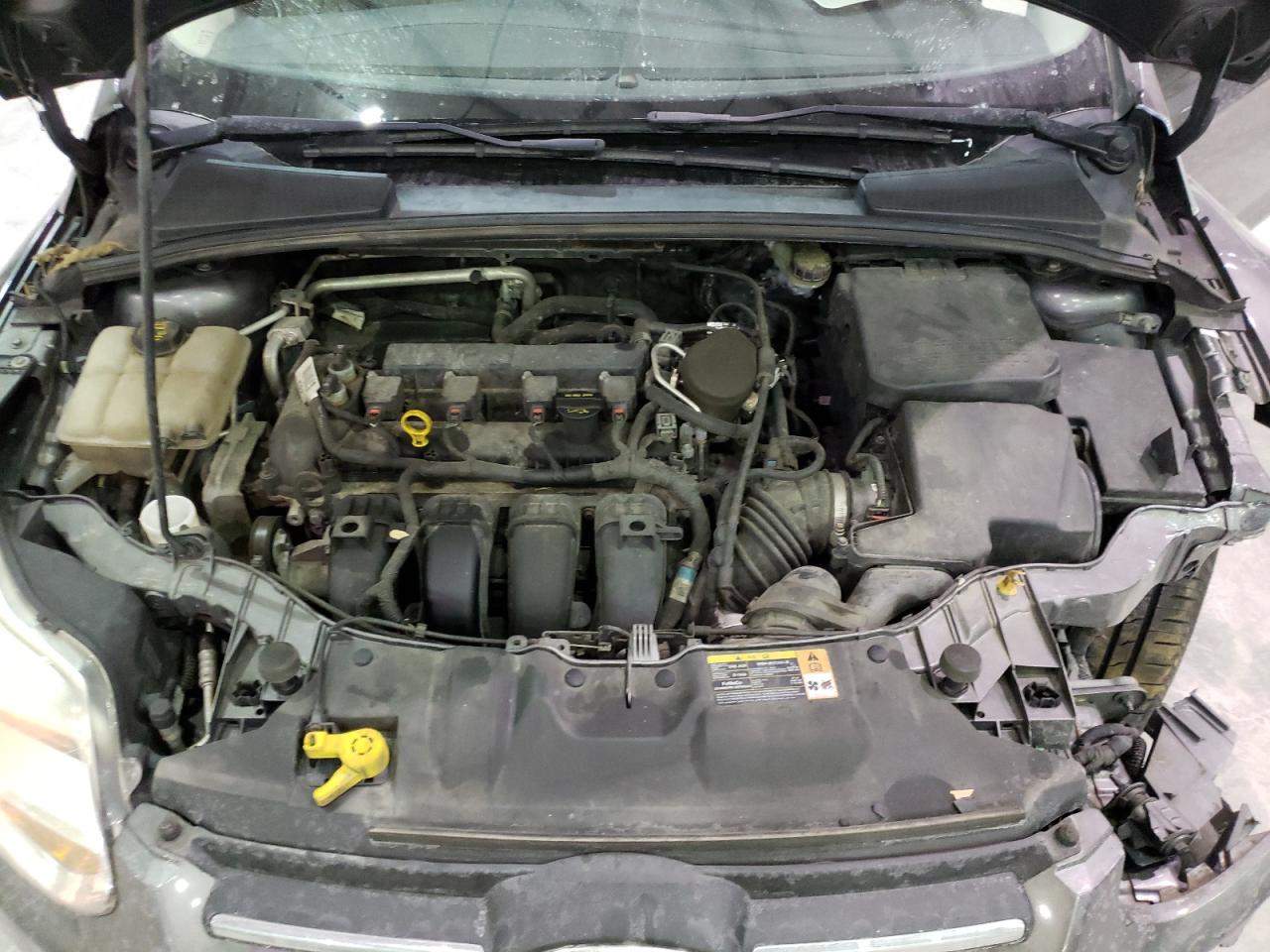 Foto 7 de la subasta – 2014 FORD FOCUS SE con VIN 1FADP3F21EL193536