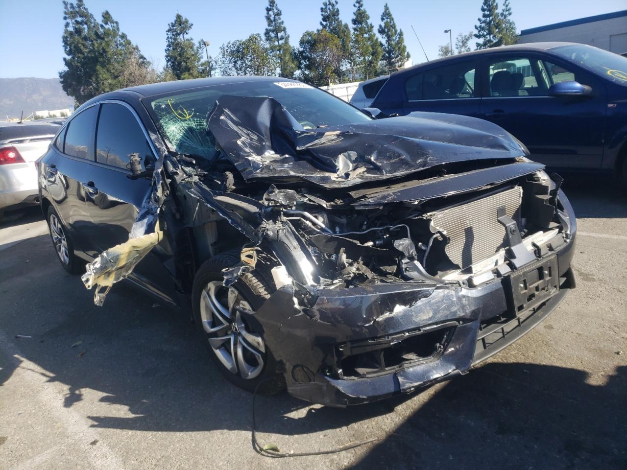 HONDA CIVIC LX 2018 with VIN 2HGFC2F52JH569852 - Photo from auction