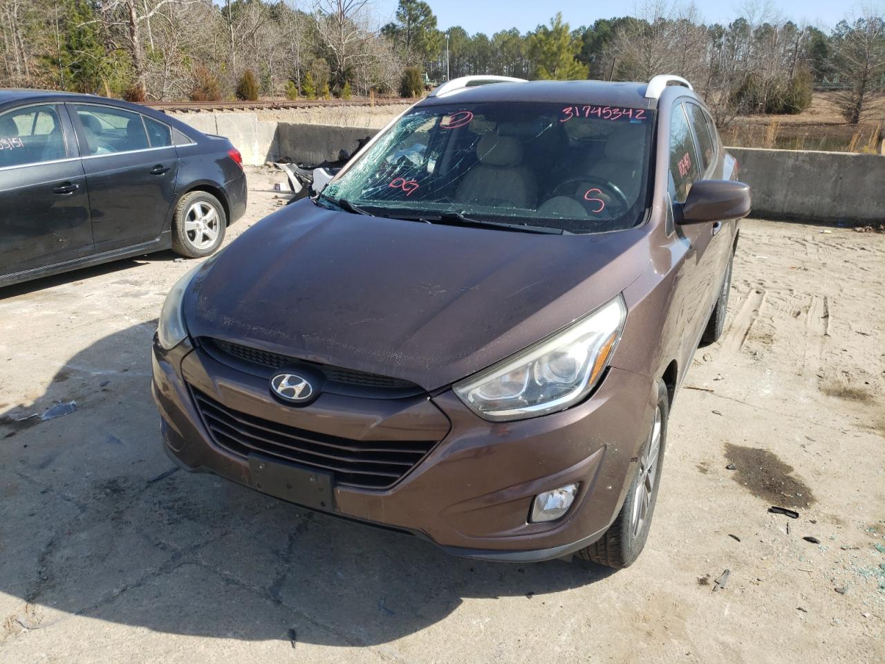 Photo 2 from auction – 2014 HYUNDAI TUCSON GLS with VIN KM8JU3AG2EU876280