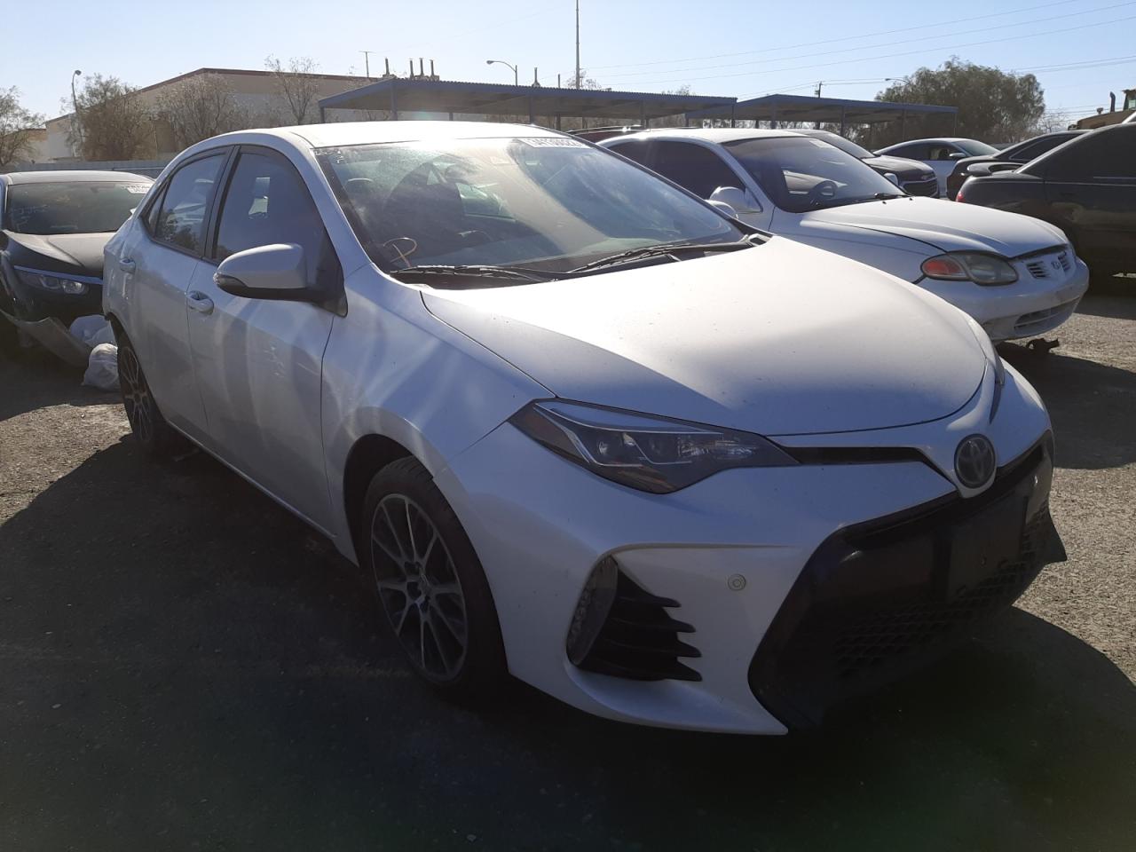 TOYOTA COROLLA L 2017 with VIN 5YFBURHE5HP596046 - Photo from auction