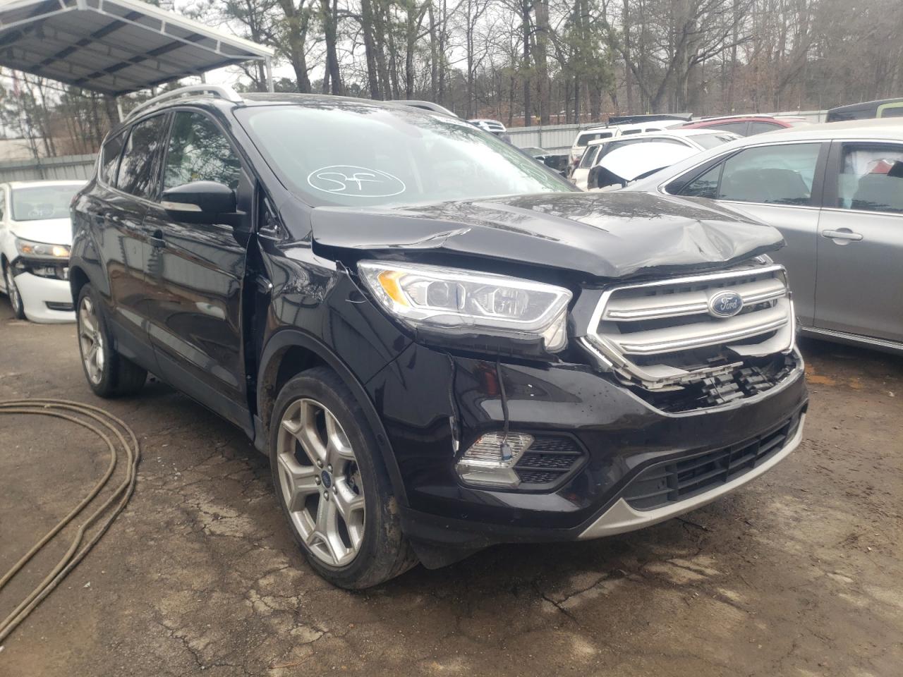 FORD ESCAPE TIT 2019 with VIN 1FMCU9J90KUA87571 - Photo from auction