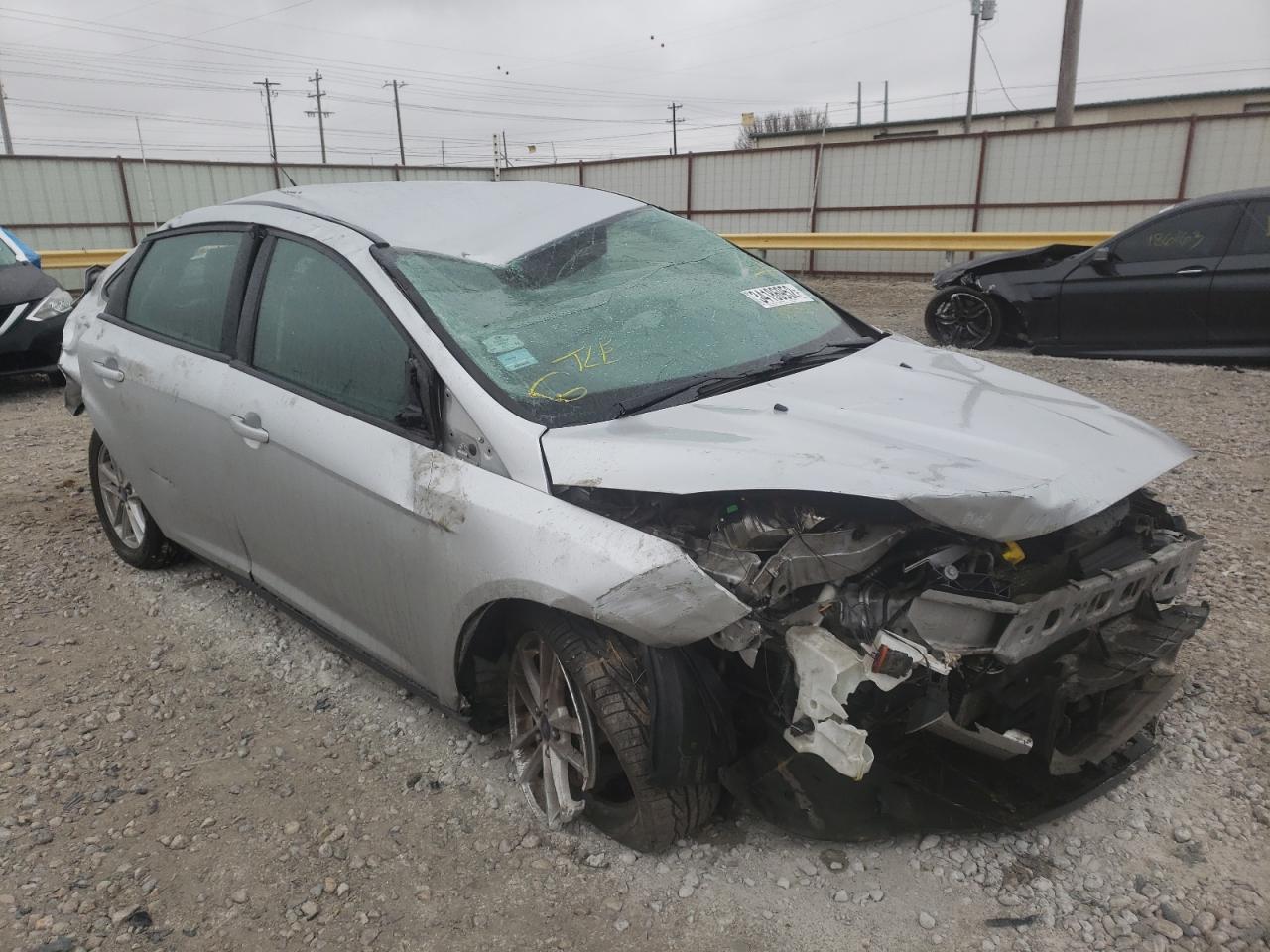 FORD FOCUS SE 2015 with VIN 1FADP3F24FL316988 - Photo from auction