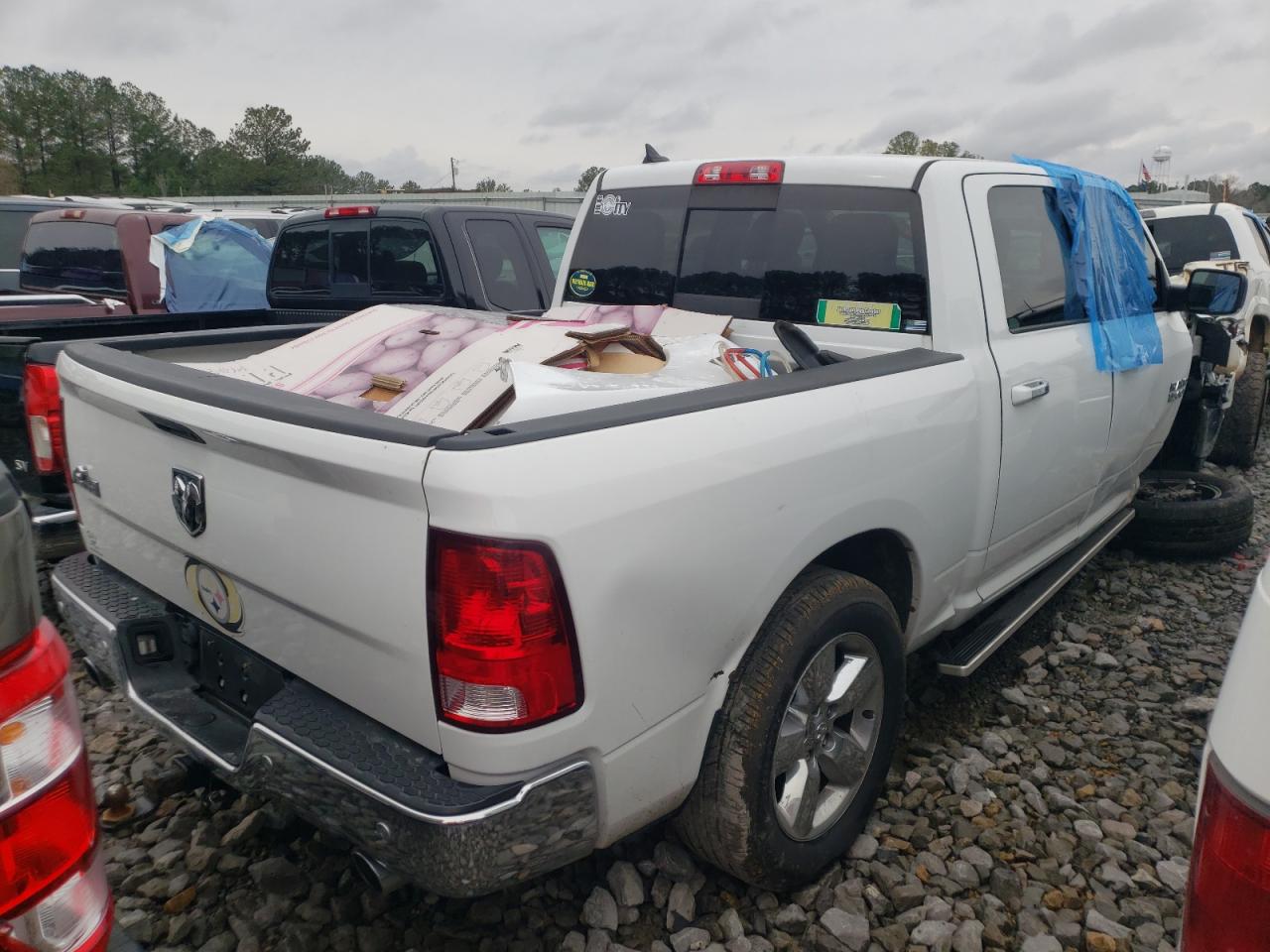 Photo 4 from auction – 2018 RAM 1500 SLT with VIN 1C6RR6LTXJS105793