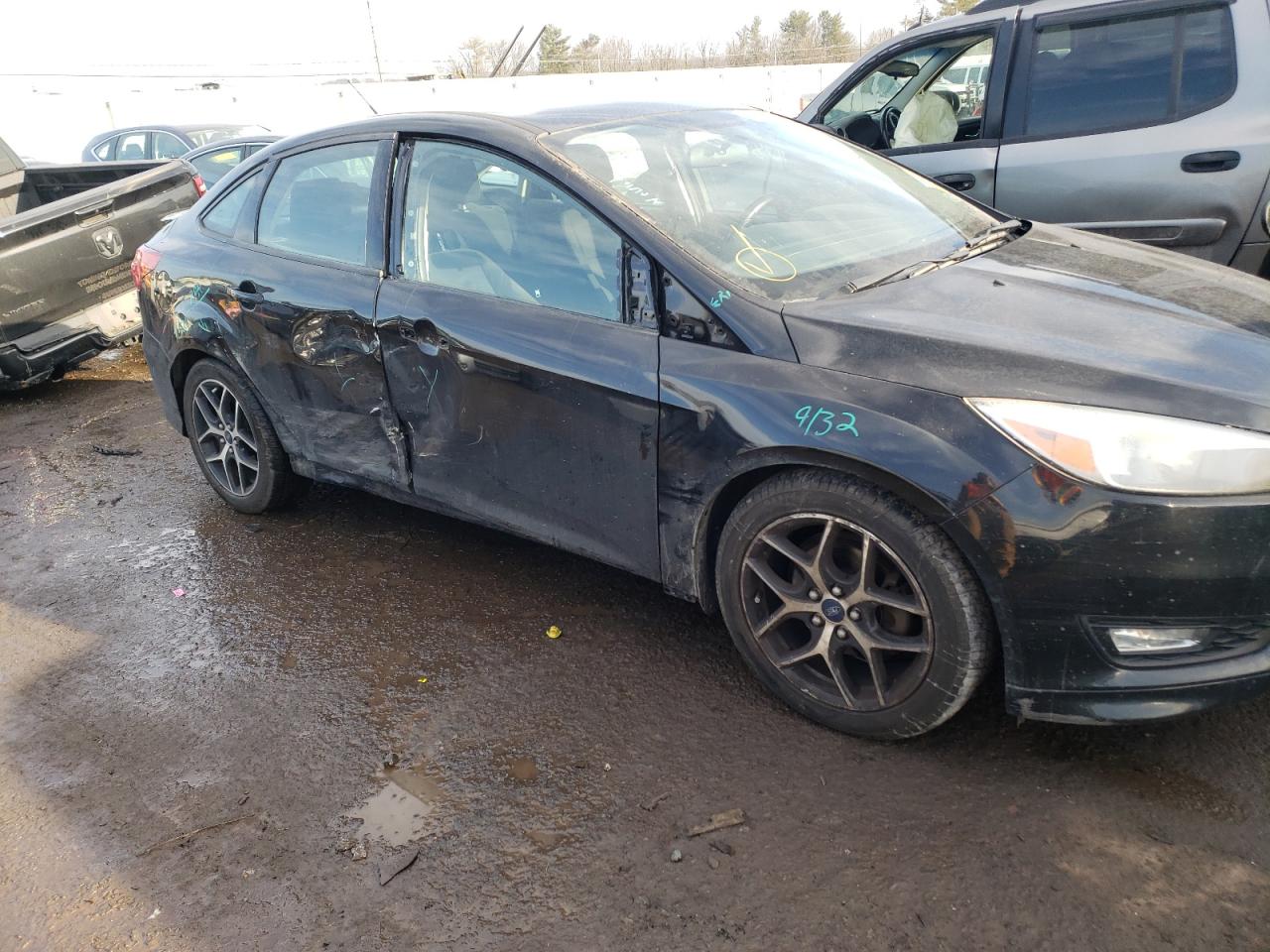 Photo 9 from auction – 2015 FORD FOCUS SE with VIN 1FADP3F25FL252136