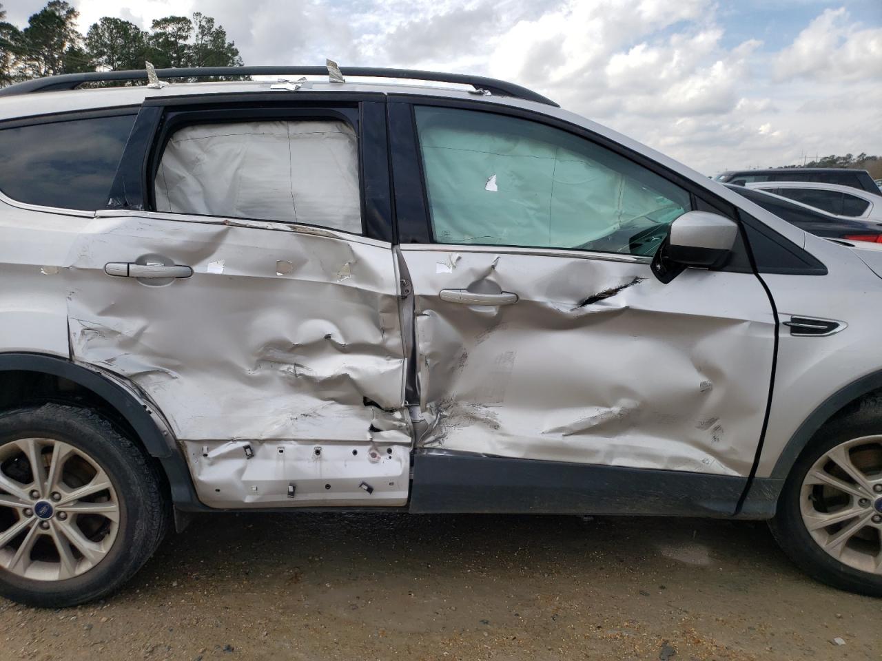 Photo 9 from auction – 2017 FORD ESCAPE SE with VIN 1FMCU9G99HUA37333