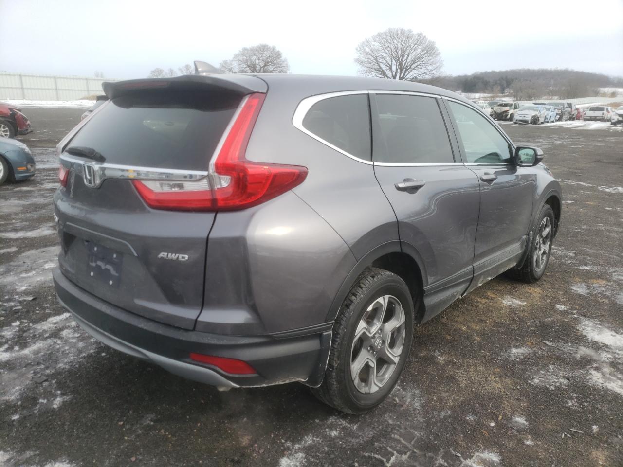 Photo 4 from auction – 2018 HONDA CR-V EX with VIN 7FARW2H56JE005616