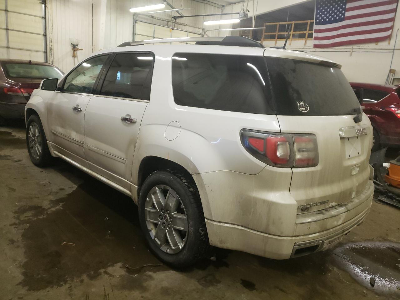 Photo 3 from auction – 2016 GMC ACADIA DEN with VIN 1GKKVTKD0GJ321086