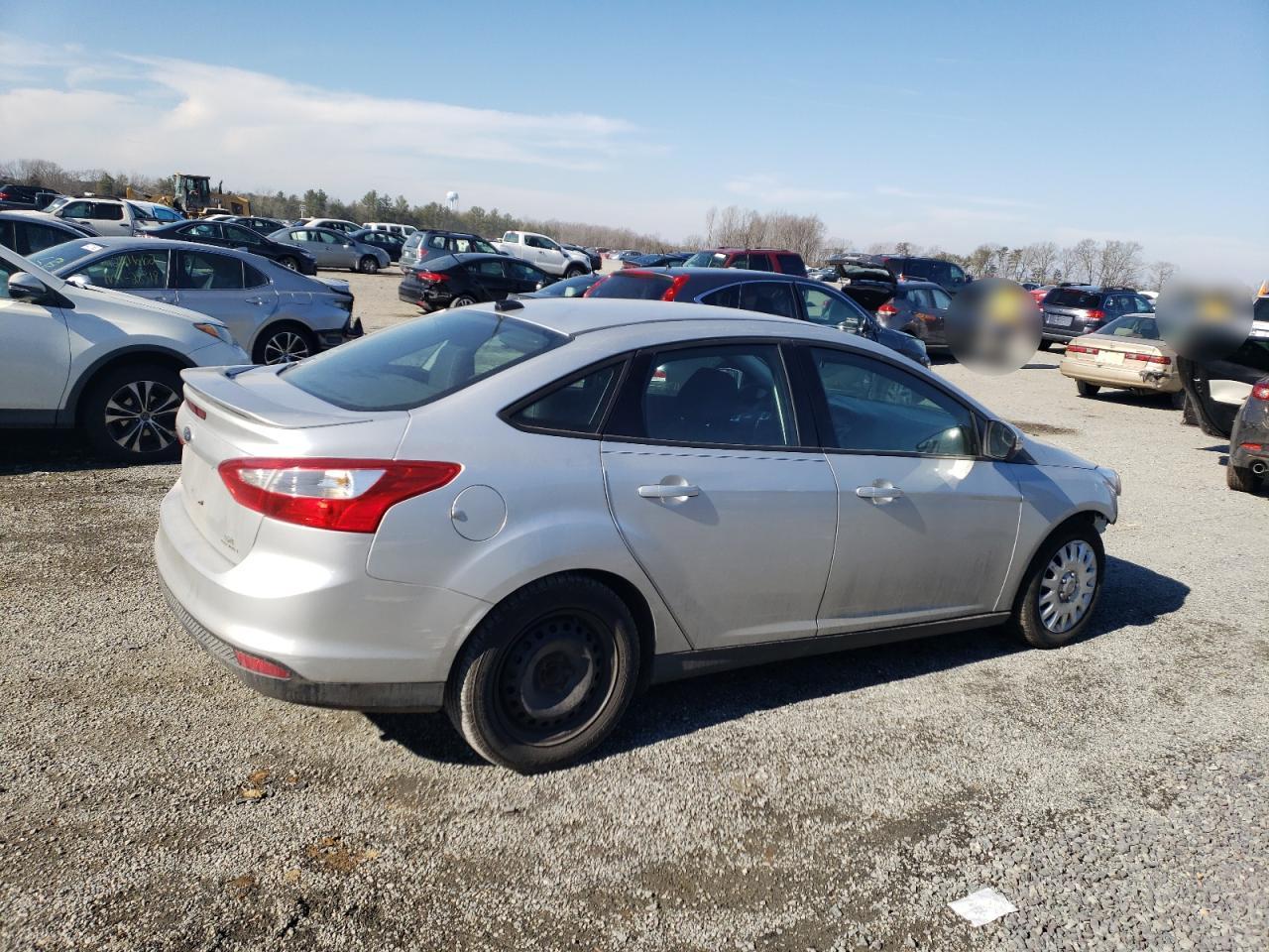 Photo 4 from auction – 2014 FORD FOCUS SE with VIN 1FADP3F24EL403661