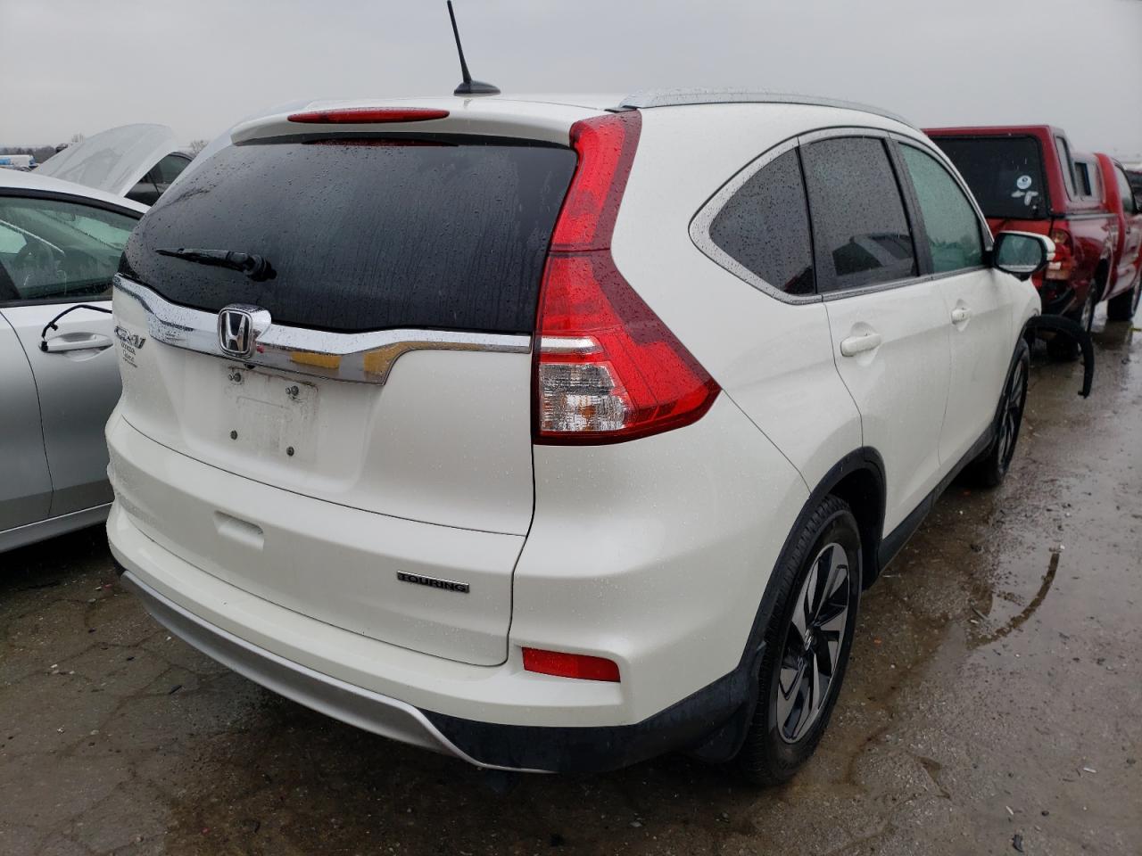Photo 4 from auction – 2016 HONDA CR-V TOURI with VIN 5J6RM3H95GL018156